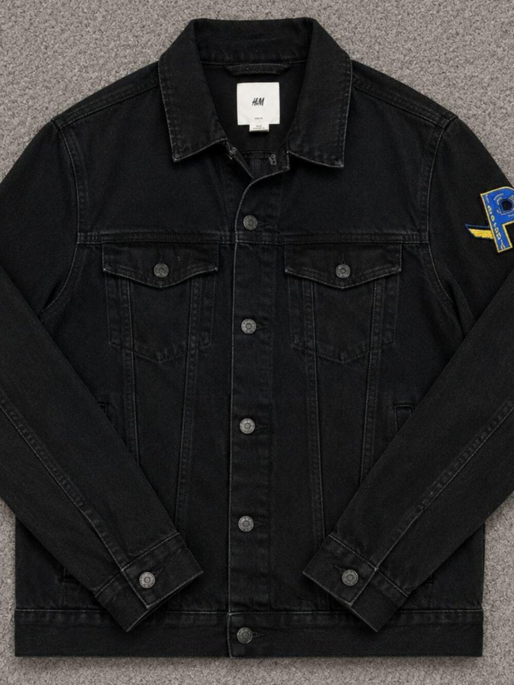 H&M Black Denim Jacket with Blue & Yellow Sleeve Patch